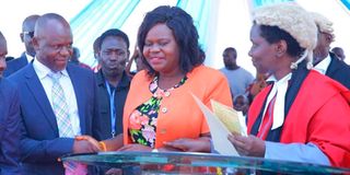 Newly elected Homa Bay Governor Gladys Wanga [C] together with her husband George Wanga.
