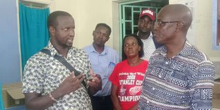 Lodwar County Referral Hospital Chief Executive Officer Dr Joseph Epem (left) and Turkana Governor Jeremiah Lomorukai