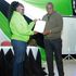 Wiper Party’s Mwalika Mboni receives his certificate from Kitui Rural returning officer Winfred Ndoti.