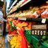 A customer picks fruits at a supermarket in Nyeri.