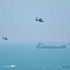 Chinese military helicopters fly past Pingtan island