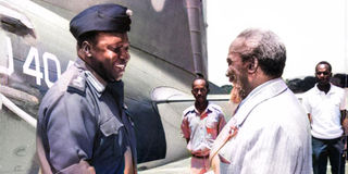 Uganda President Idi Amin is welcomed by President Jomo Kenyatta.