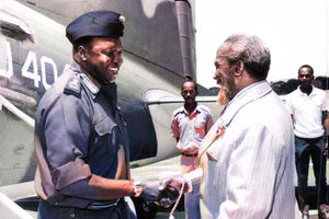 Uganda President Idi Amin is welcomed by President Jomo Kenyatta.