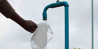 Water flowing from a tap