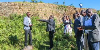 Baringo Governor Benjamin Cheboi (gesturing) with other county government officials touring the stalled Kabarnet stadium 