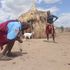 Mr James Ngitira, a resident of Nakwakaal village in Turkana East Sub County collecting spent cartridges outside his home