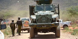 Security officers in an Armored Personnel Carrier patrol Kasiela in Baringo South.