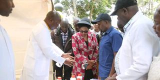 Trans Nzoia Governor George Natembeya (right) with county Agriculture, Cooperatives and Livestock CEC Mrs Mary Nzomo