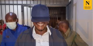 John Waluke jail smiles