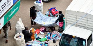 Hawkers spread their wares for sale along Luthuli Avenue