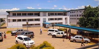 Trans Nzoia Governor George Natembeya with health officials during a tour of the new County referral hospital