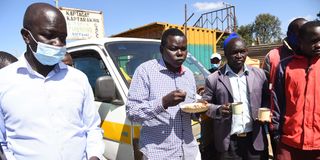 Mr William Chepkut (then Ainabkoi MP) in the company matatu drivers, conductors and boda-boda-riders 