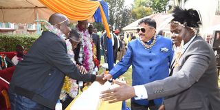 Mr William Chepkut (right), introducing his son Nicholas Biwott to Dr. Swarup Mishra (former Kesses MP)