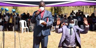 Mr William Chepkut (right-then Ainabkoi MP) Bishop Patrice Chumba of Africa Inland Church, Eldoret