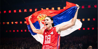 Serbia captain Tijana Boskovic celebrates with the flag 