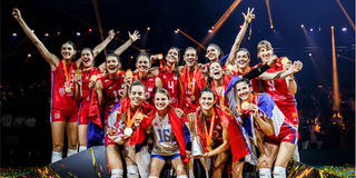 Serbia players celebrate with the trophy 