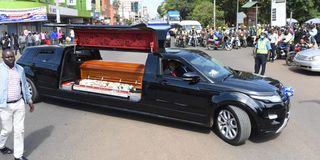 The hearse carrying the body of former Ainabkoi MP William Chepkut from Eldoret International Airport to Eldoret town