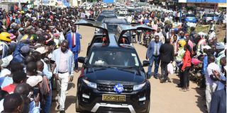 Funeral cortege of former Ainabkoi MP William Chepkut makes its way into Eldoret town from Eldoret International Airport