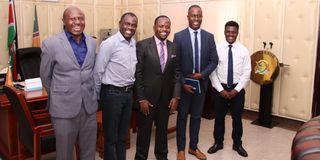 Kitale Film Week director Peter Pages Bwire (right) with other officials during a courtesy call on Governor George Natembeya