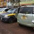 A passenger at a matatu stage in Nyeri which has been taken over by Toyota Sienta vehicles