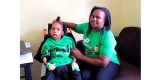 Carol Chege, 40, with her seven-year-old child Precious Blessing who has Cerebral Palsy