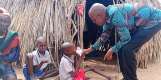 Turkana Governor Jeremiah Lomorukai visiting a family in Loima sub-county on November 7, 2022