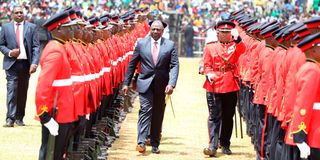 President Dr William Ruto inspects a guard of honour during the Mashuja Day celebrations