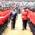 President Dr William Ruto inspects a guard of honour during the Mashuja Day celebrations