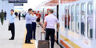 Passengers at the Nairobi terminus boarding bay