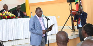 Uasin Gishu Governor Jonathan Bii presents his submission to team collecting views on conferment of Eldoret town to city status