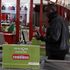 A man walks past a Lipa Na M-Pesa counter at a supermarket in Nairobi.