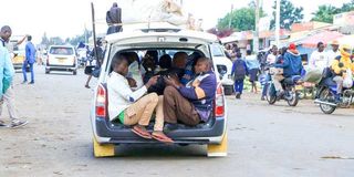 Passengers in an overloaded Toyota Probox operating on the Rongo-Homa Bay highway.