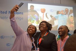 Homa Bay Governor Gladys Wanga take a photo with some Kenyans at the COP27