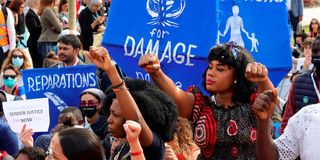 Climate activists demonstrate at the Sharm el-Sheikh International Convention Centre, Egypt