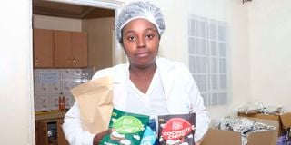 Judy Mugure from Kinoo in Kiambu displays coconut chips which she makes from raw coconut.