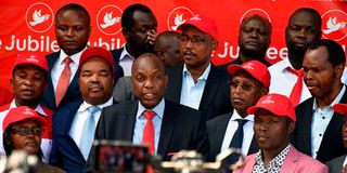 Jubilee Secretary-General Jeremiah Kioni (centre) addresses journalists at the party’s headquarters