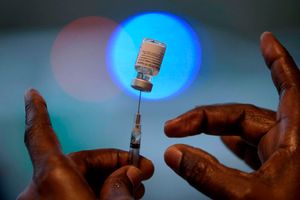 vaccine injection syringe bottle BioNTech Covid-19 