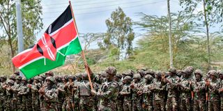 KDF soldiers attend a flag presentation ceremony before their deployment to the DRC