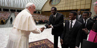 Pope Francis greets The Black Blue Brothers.