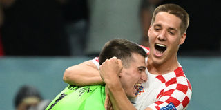 Croatia's Pasalic and Livakovic celebrate