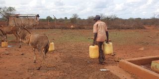 A man fetching water in Kitui
