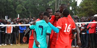 KDF players celebrate