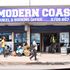 Passengers wait for buses outside a Modern Coast booking office in Mombasa