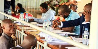 Kisii County revenue officers line up to present their credentials during a staff audit at Gusii Stadium