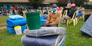 Form One students wait to be admitted at Elburgon Secondary School in Nakuru County