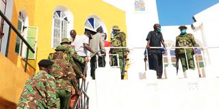 A contingent of police officers at The Holy Ghost Coptic Church in Kisumu