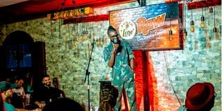 Eric Lu Savali performing at a stand-up comedy event organised by Punchline Comedy Club in Dar Es Salaam