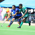 Mohamed Nourelden of Zamalek dribbles past Derrick Wakwabubi of Western Jaguars