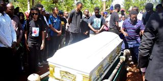 The remains of Regina Wairimu, 22, being laid to rest on February 21, 2023.