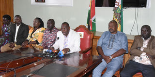 Governor Jonathan Bii Chelilim third (right), his deputy John Barorot on Finland study scam